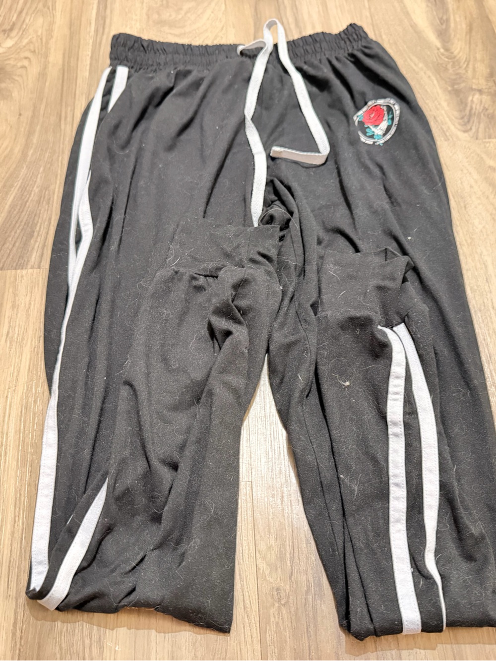 Black Women's Track Joggers with Contrast Stripes and Rose Patch